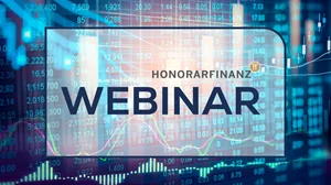 das Wort Webinar vor einem Trading Chart