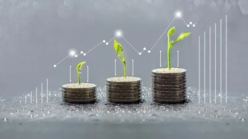 three growing piles of coins